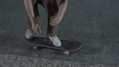 Skateboard Trick FS 180 Kickflip Position des Pieds