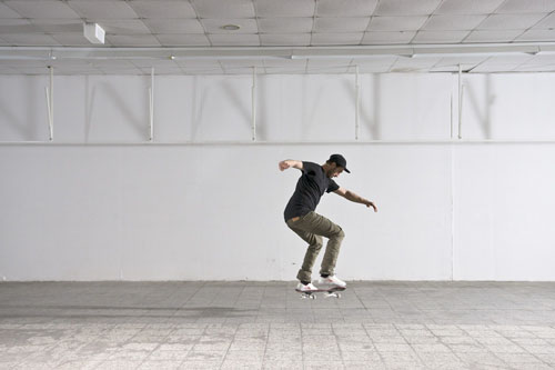 Skateboard Trick FS 180 Kickflip