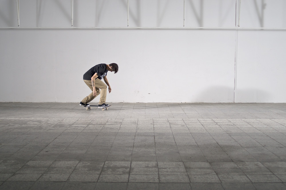 Skateboard Trick BS 180 Kickflip