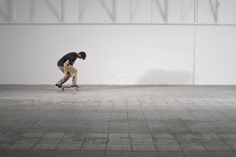 Skateboard Trick BS 180 Kickflip