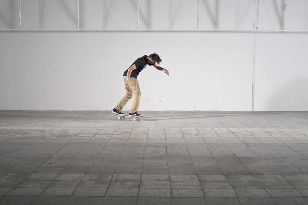Skateboard Trick BS 180 Kickflip